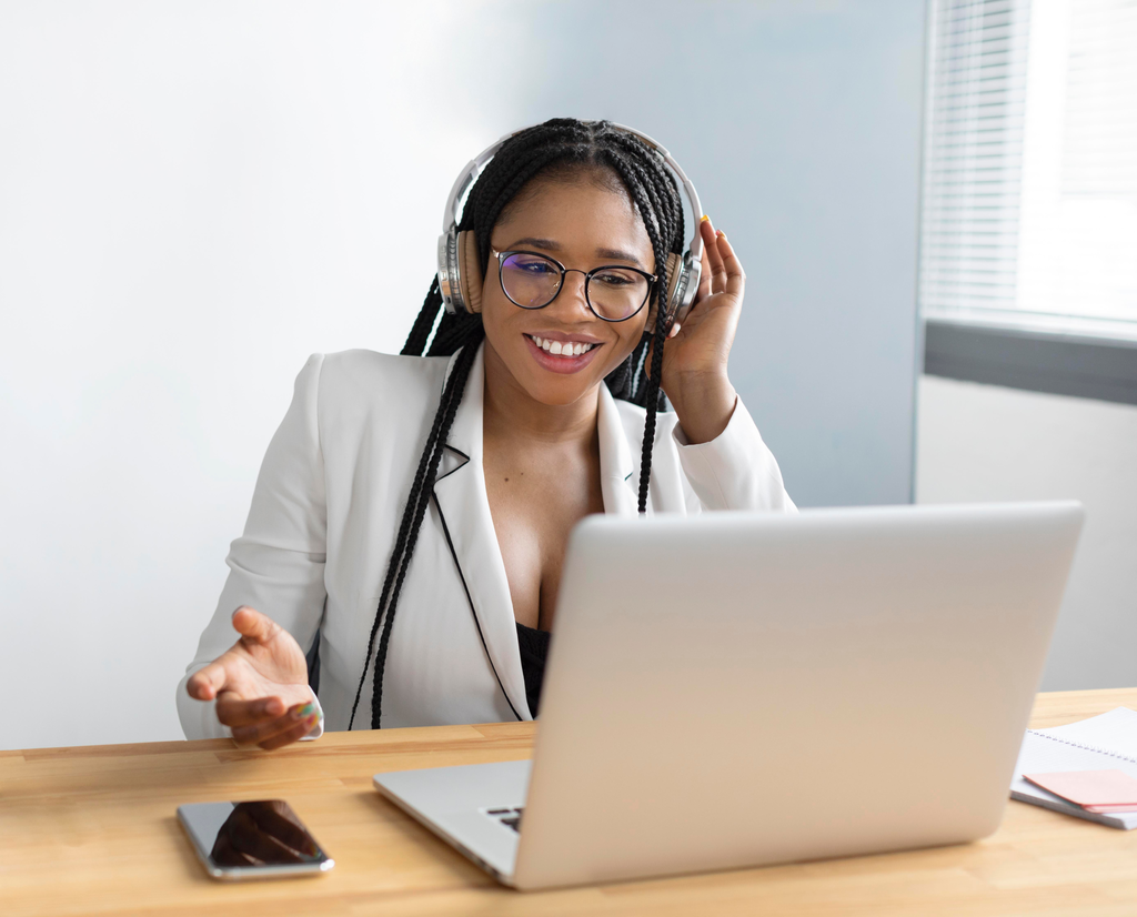 Virtual assistant working on laptop