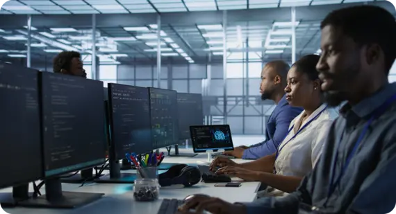 Managed IT operations team working in control room