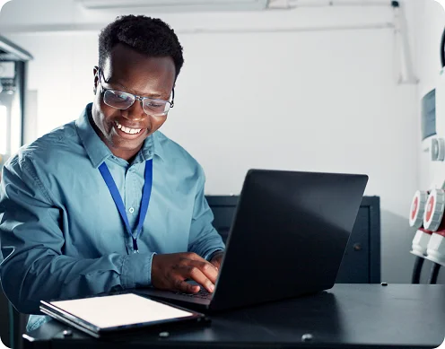 IT engineer working on laptop