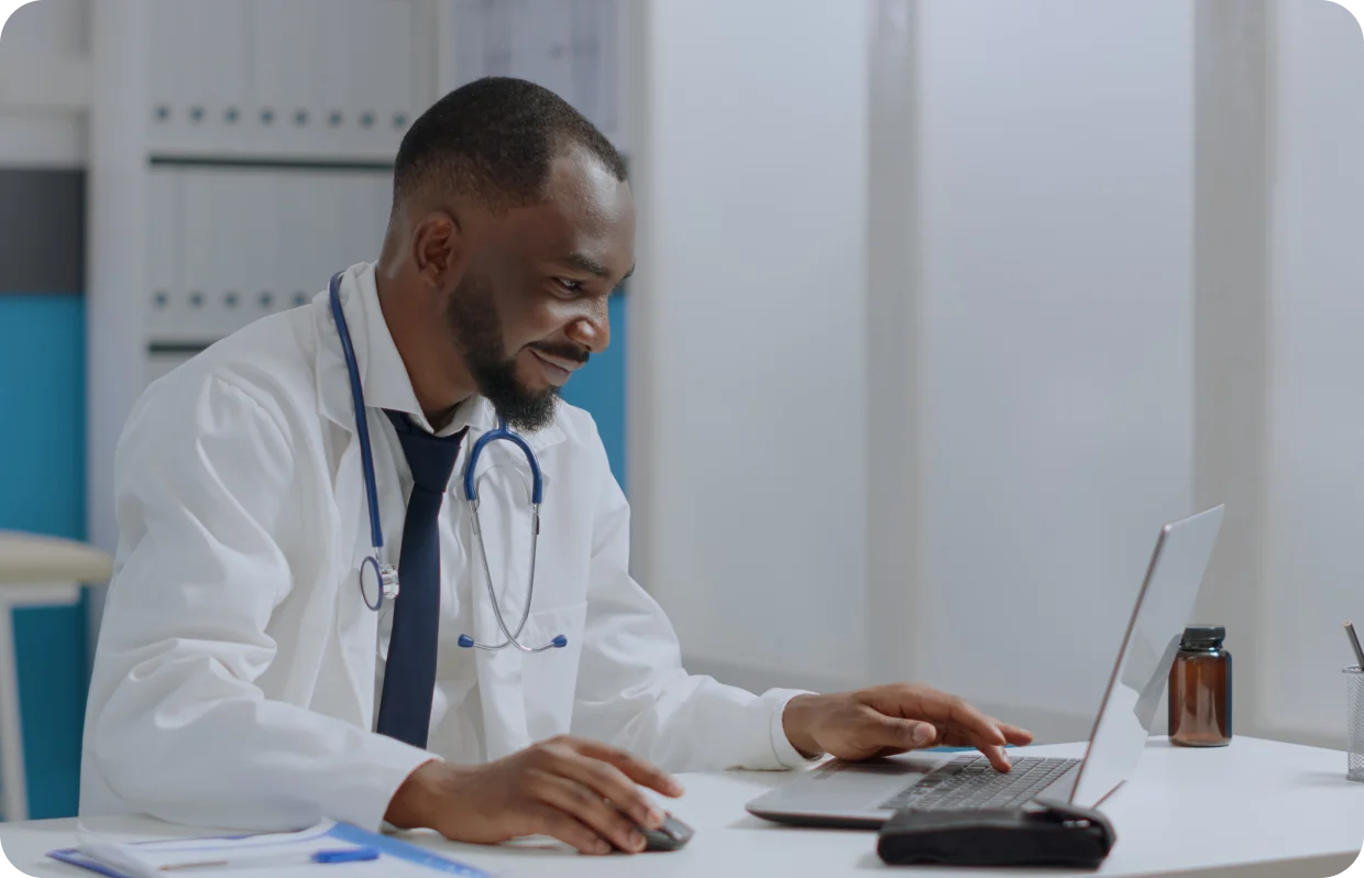 Doctor using laptop